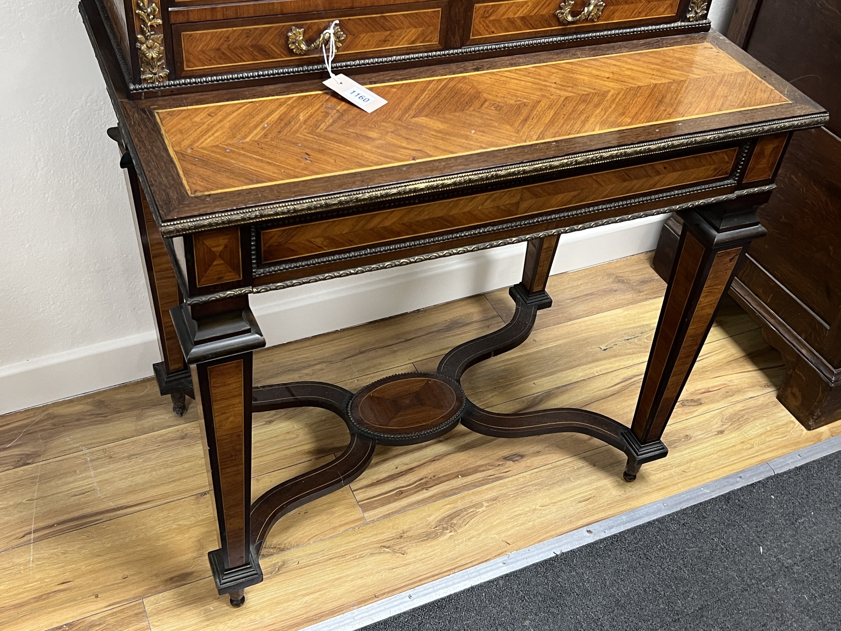 A French kingwood and gilt metal mounted side cabinet, width 82cm, depth 51cm, height 136cm